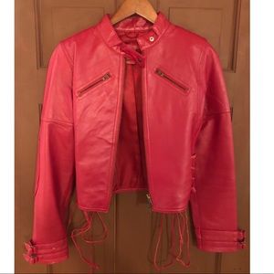 Red leather jacket with cross ties on sides.